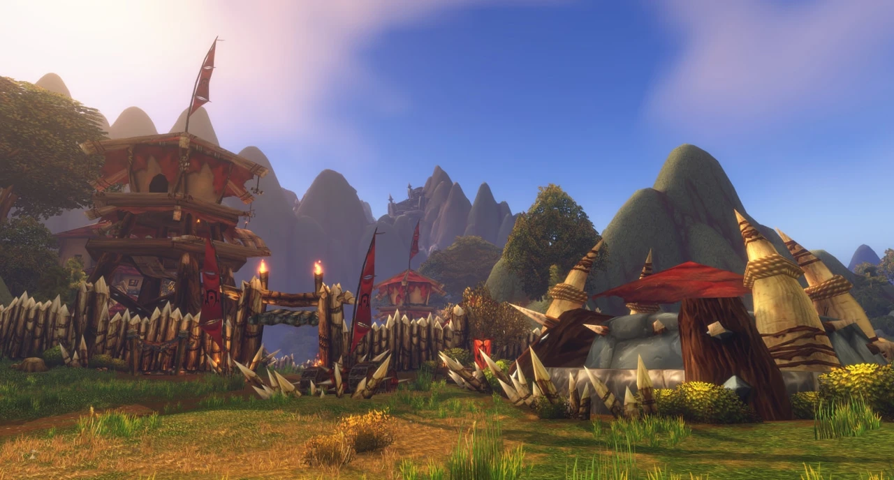WoW Forever outdoor settlement framed by rocky peaks