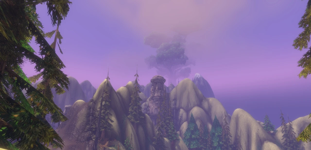 Mount Hyjal viewed through evergreen trees beneath a purple sky