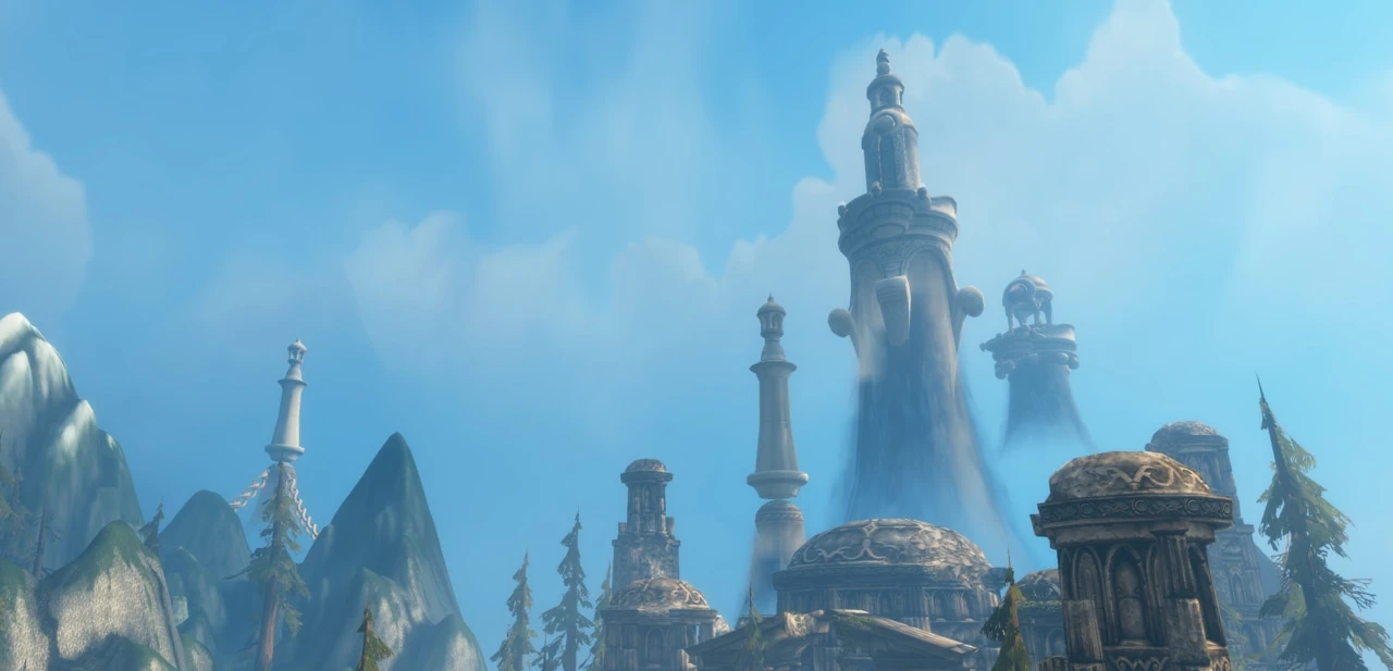 Zephras Isle towers rising through clouds above pale mountain peaks
